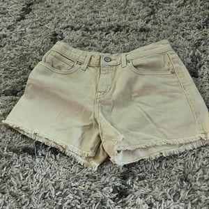 Old navy creamy lemon colored size 12 girls jean shorts
